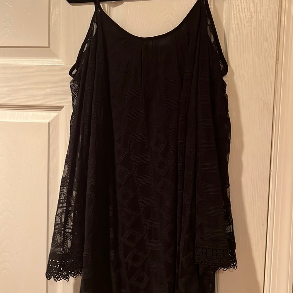 Black embroidered dress with off the shoulder sleeve